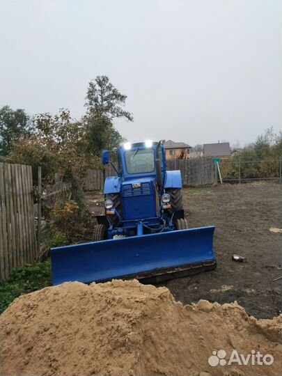 Чистка снега трактором