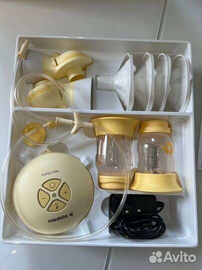 Молокоотсос medela swing maxi flex