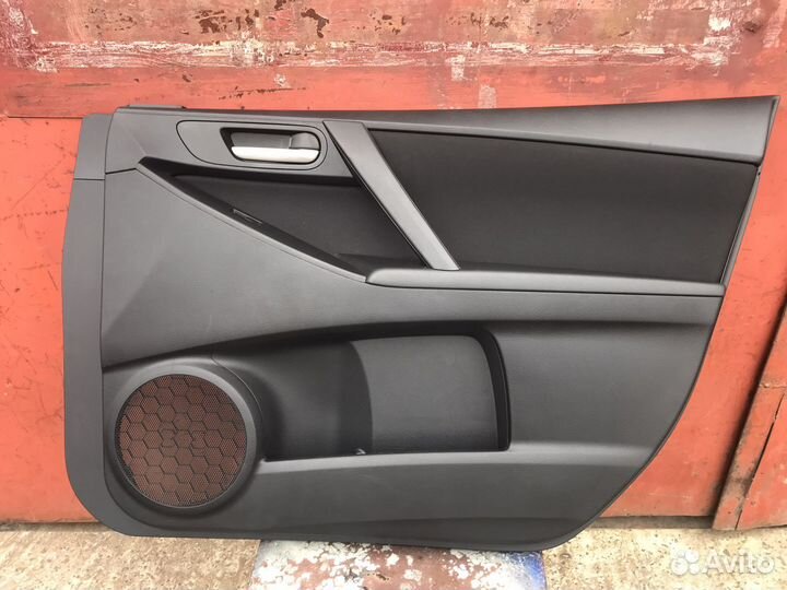 Обшивка двери (карта) Mazda 3 BL 2010