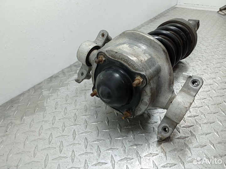 Б/У Амортизатор задний левый в сборе 7P6513029BG