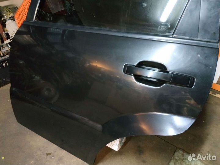 Дверь задняя без молдинга черная Ssang Yong Rexton