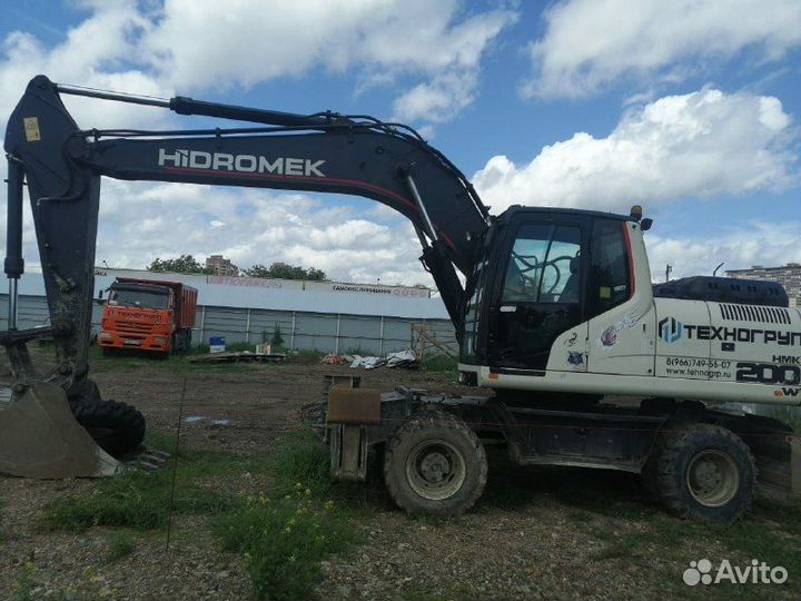 Экскаватор колесный