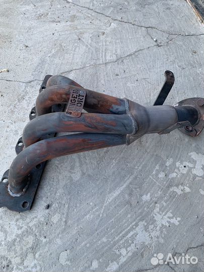 Выхлопной коллектор Опель astra j