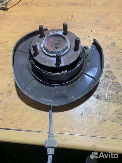 Кулак со ступицей задний правый Mitsubishi Lancer