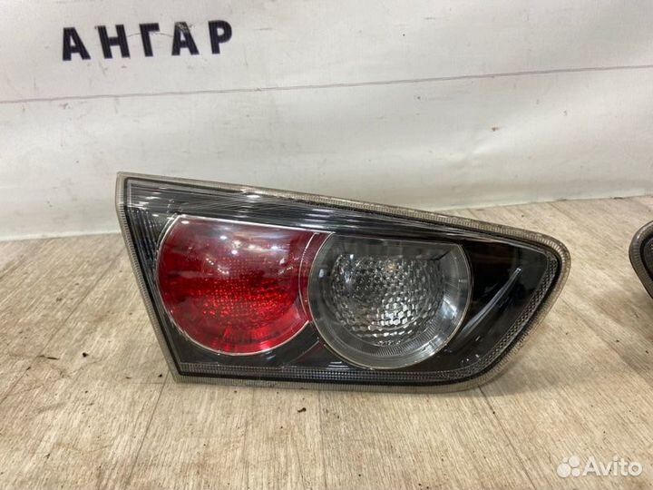 Фонарь в крышку багажника задний Mitsubishi Lancer