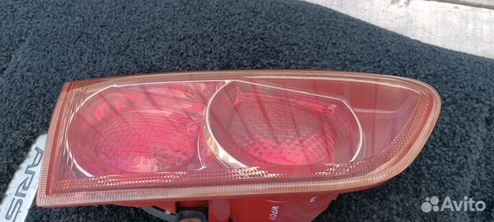 Фонарь левый в крышку багажника Лансер 10 седан