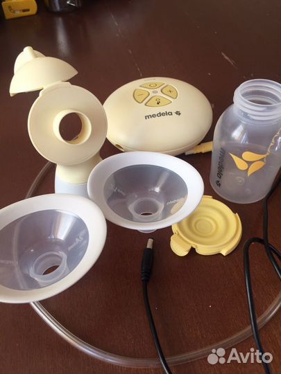 Молокоотсос medela swing электрический