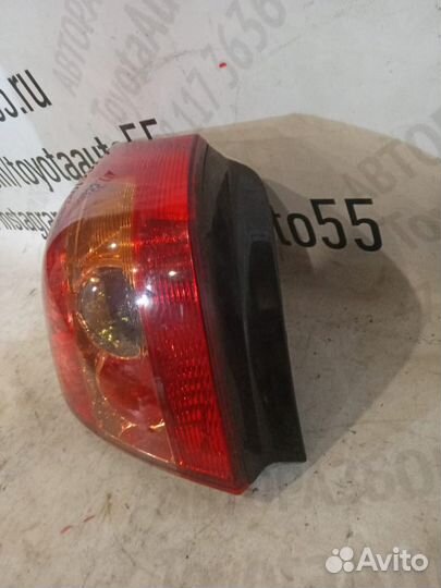 Фонарь левый Тойота Королла Е120 хэтчбек