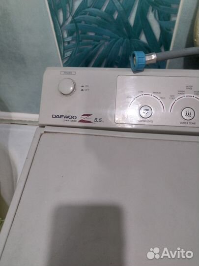 Стиральная машина с вертикальной загрузкой