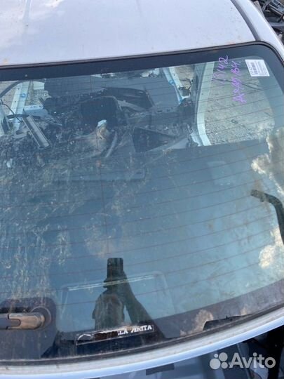 Стекло заднее Toyota Corolla Axio NZE164 1NZ-FE