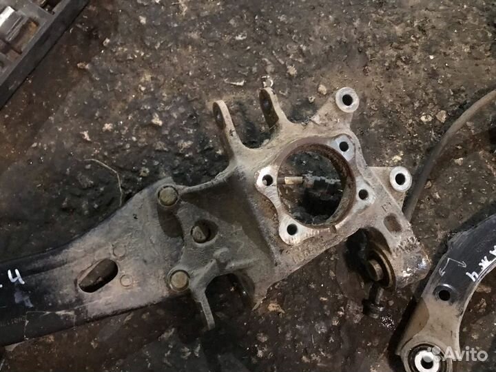 Задний кулак цапфа Kia Sportage 4