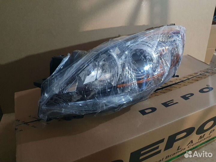 Фара левая Mazda 3 2009-2011