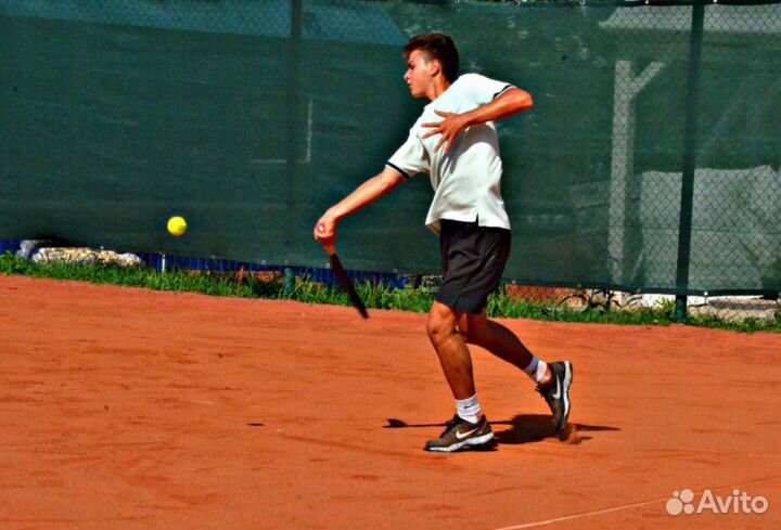 Тренер по теннису
