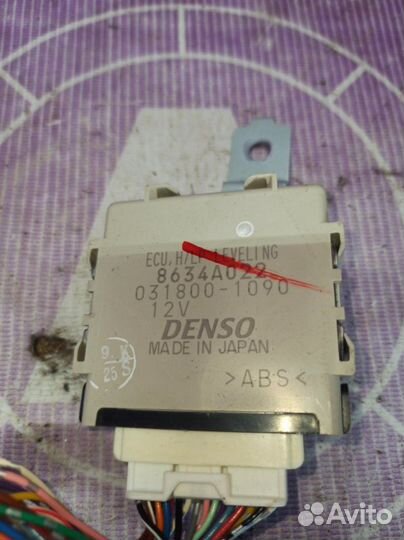 Блок управления корректора фар Mitsubishi