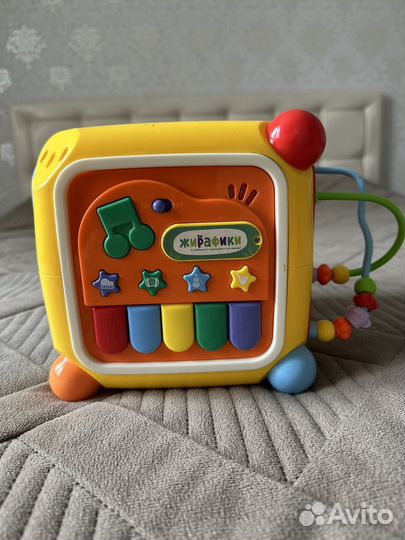 Развивающая игрушка сортер Мультикуб Жирафики