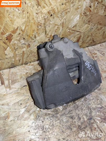 Суппорт тормозной передний правый Opel Astra H