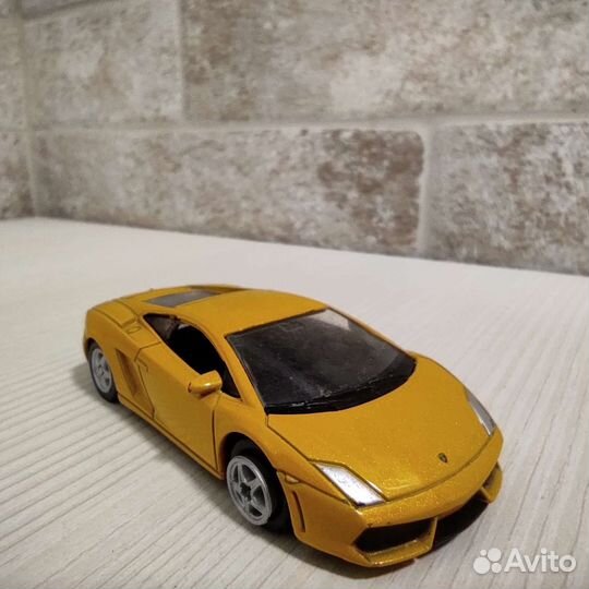 Модель Lamborghini Gallardo LP860-4 1:64 Welly