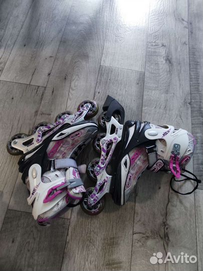 Роликовые коньки