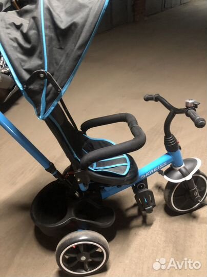 Трехколесный велосипед с ручкой