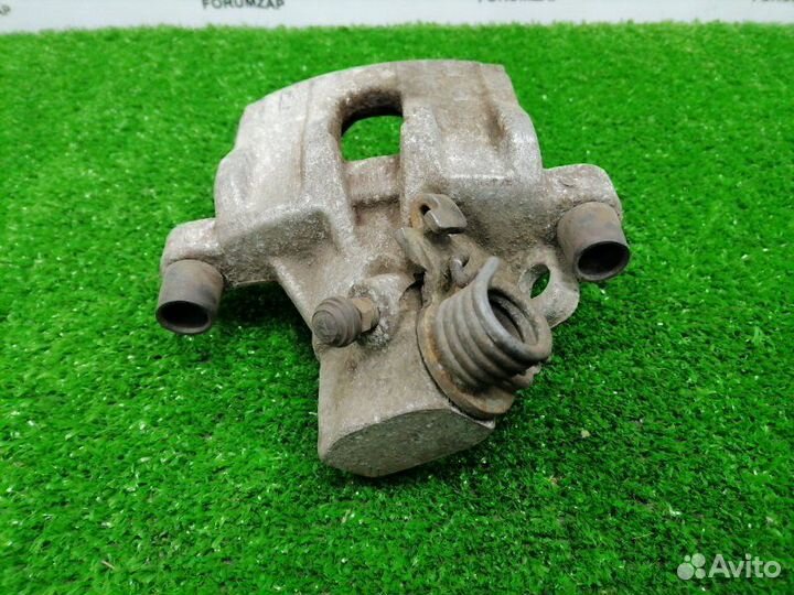 Суппорт тормозной задний левый Ford Focus