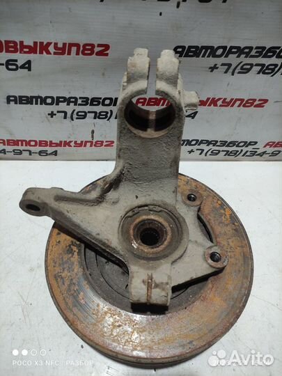 Кулак поворотный левый Пежо 206