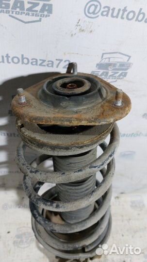 Стойка подвески передняя левая Geely Emgrand Ec7