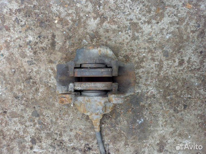 Суппорт тормозной задний левый Mercedes-Benz