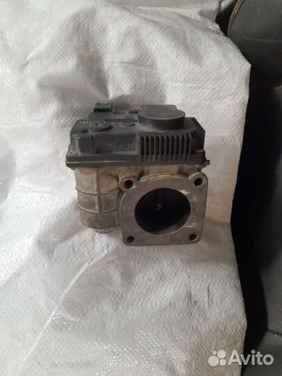 Дроссельная заслонка Nissan Almera Classic