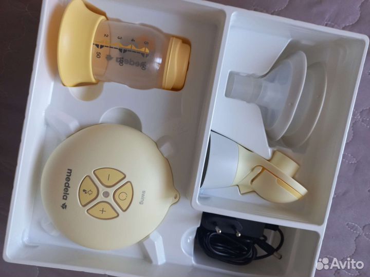Молокоотсос medela swing flex электрический