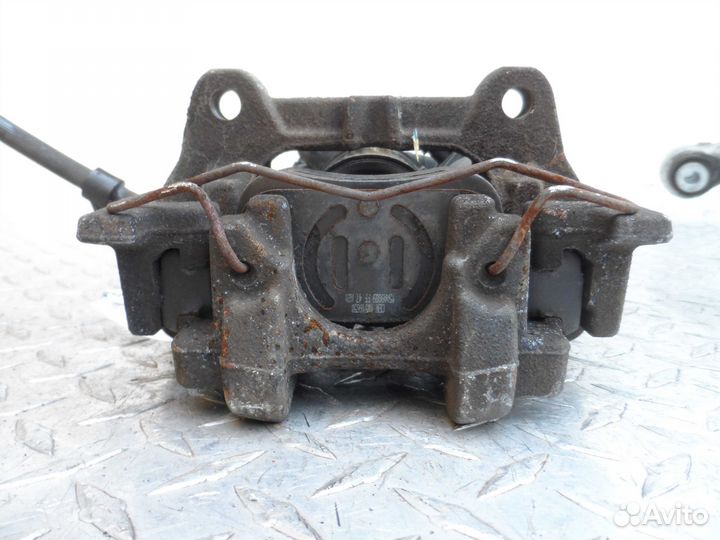 Суппорт задний правый Ford Fusion 2 USA DG9C2D250A