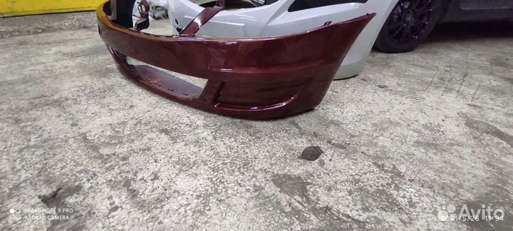 Бампер передний Renault Logan 2010 - 2014 красный