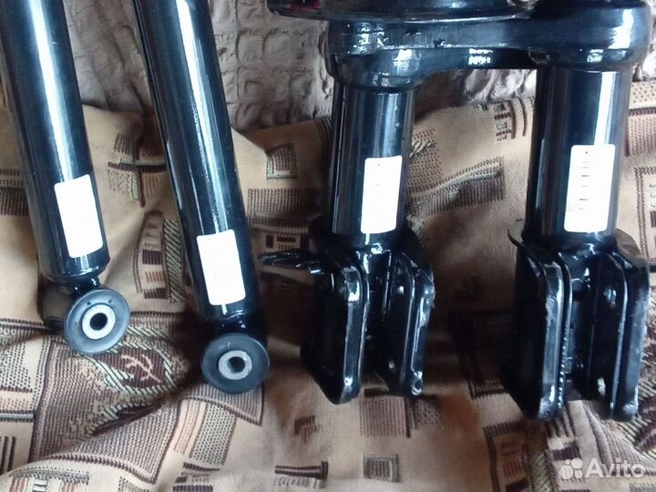 Стойки амортизаторные
