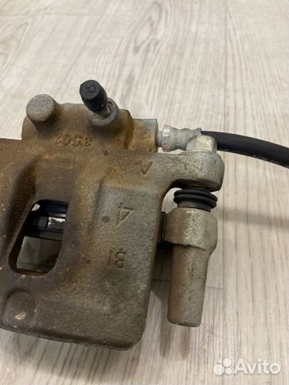 Суппорт задний правый Mitsubishi Lancer 10 CY3A