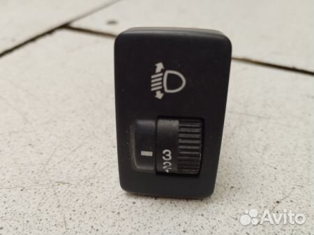 Кнопка корректора фар