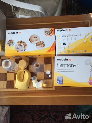 Молокоотсос medela электрический
