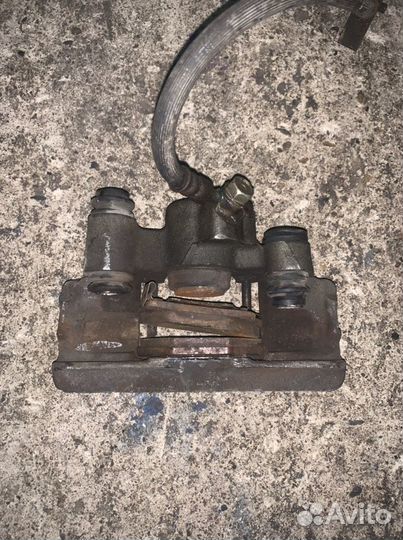 Суппорт задний правый Тойота Ярис 10, Витц 10