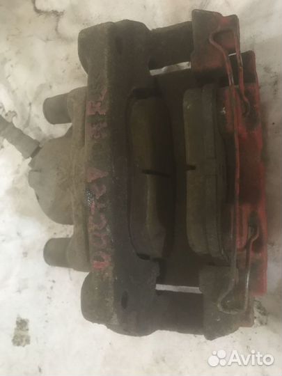 Суппорт тормозной передний правый Renault Duster