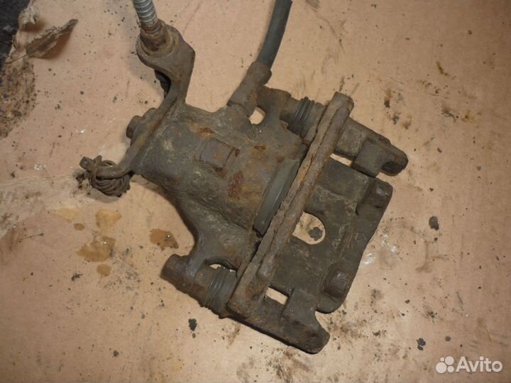 Суппорт задний левый Форд фокус 1