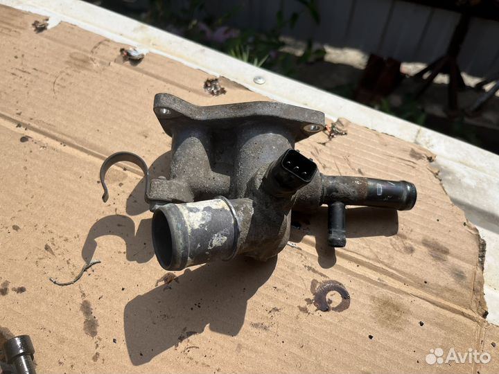 Флянец системы охлаждения на киа сид 2007