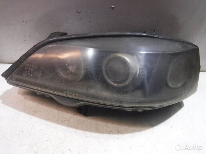 Фара левая Opel Astra G