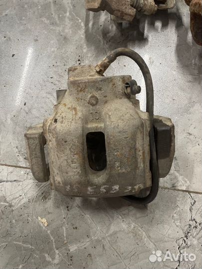 Суппорт тормозной передний левый Bmw X5