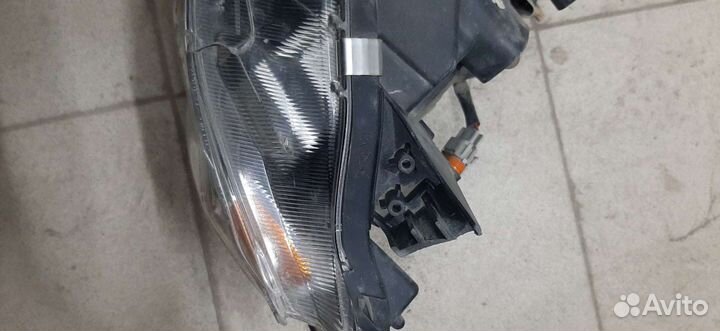 Фара Л. Mitsubishi Lancer X/2009