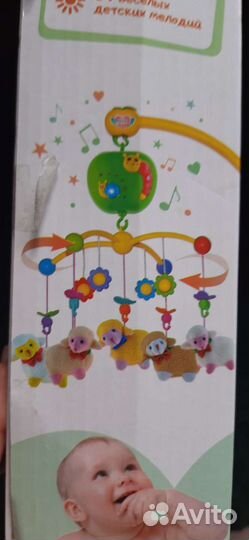 Мобиль в кроватку с проектором и 70 мелодиями