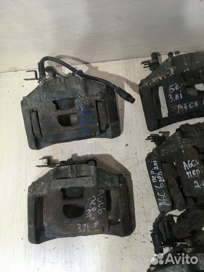 Суппорт тормозной передний левый Ауди А6 С6