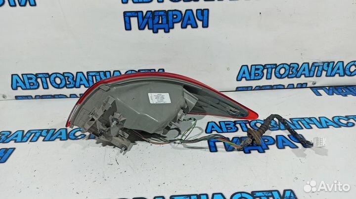 Фонарь задний наружный левый Nissan Almera G15 265