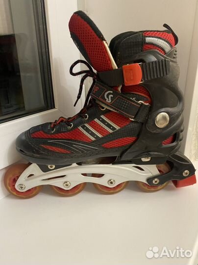Коньки роликовые