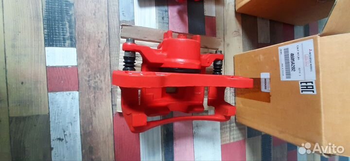 Суппорт mitsubishi L200 4605A202