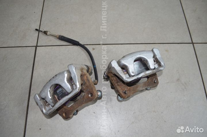 Суппорт тормозной задний левый правый Mazda 6 GJ