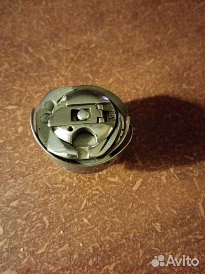 Челнок со шпульным колпачком