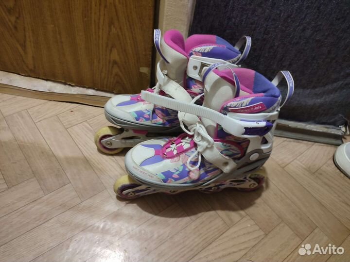 Роликовые коньки